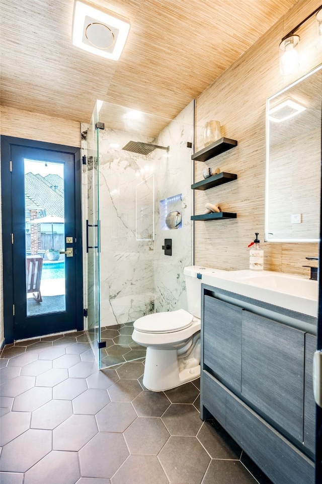 1495 Bent Trail Cir, Southlake, TX 76092 - full bath with a marble finish shower, vanity, toilet, tile patterned floors, and wooden ceiling