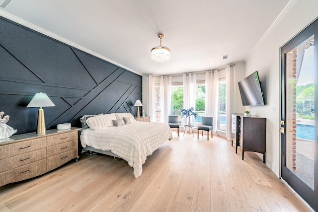1495 Bent Trail Cir, Southlake, TX 76092 - bedroom with ornamental molding, light wood-style floors, multiple windows, and access to outside