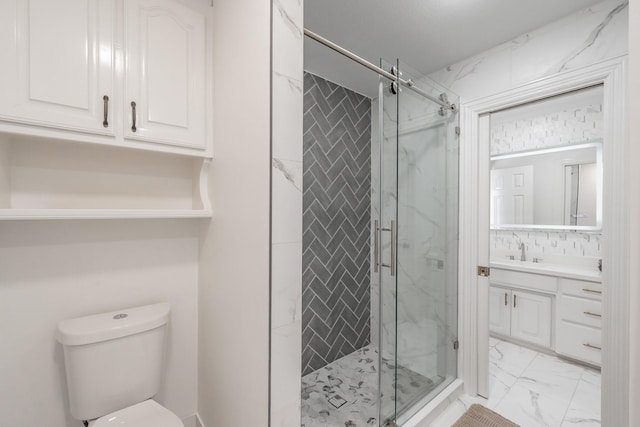 1495 Bent Trail Cir, Southlake, TX 76092 - bathroom featuring marble look tiles, vanity, a marble finish shower, and toilet