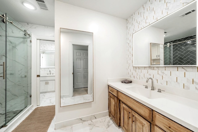1495 Bent Trail Cir, Southlake, TX 76092 - bathroom featuring marble finish flooring, a marble finish shower, and vanity