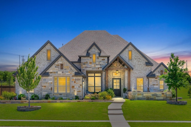 2121 Glenbrook St, Haslet, TX 76052 - french provincial home featuring stone siding and a front yard