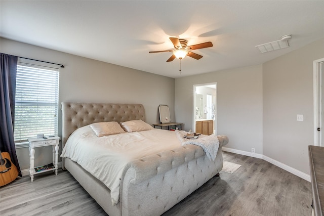 2308 Pheasant Run, Melissa, TX 75454 - bedroom with light wood finished floors, baseboards, a ceiling fan, and ensuite bathroom