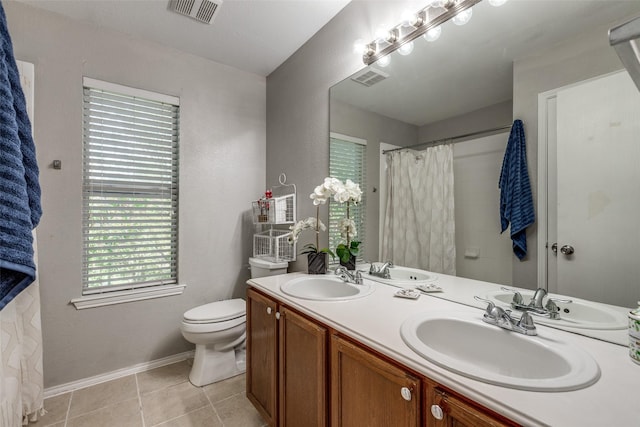2308 Pheasant Run, Melissa, TX 75454 - bathroom featuring toilet, double vanity, tile patterned floors, baseboards, and a shower with curtain