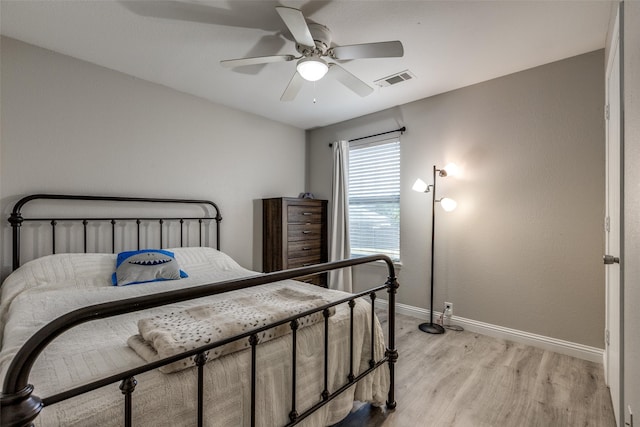 2308 Pheasant Run, Melissa, TX 75454 - bedroom with baseboards, light wood-style flooring, and a ceiling fan