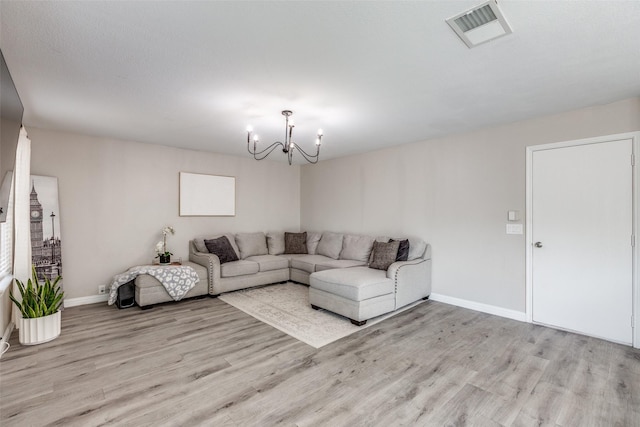 2308 Pheasant Run, Melissa, TX 75454 - living area with a chandelier, light wood-style flooring, and baseboards