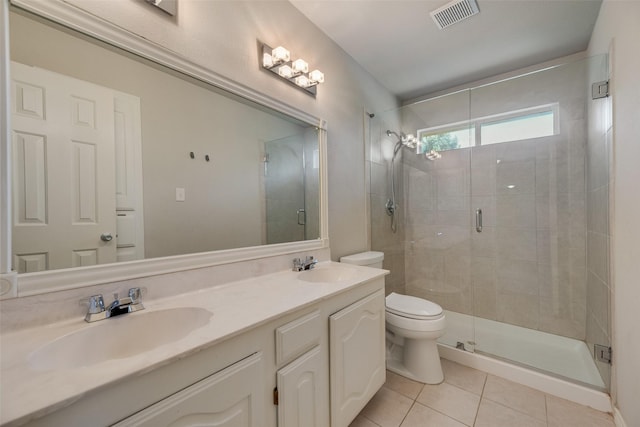3208 Greenglen Dr, Carrollton, TX 75007 - full bath featuring toilet, tile patterned flooring, double vanity, and a stall shower