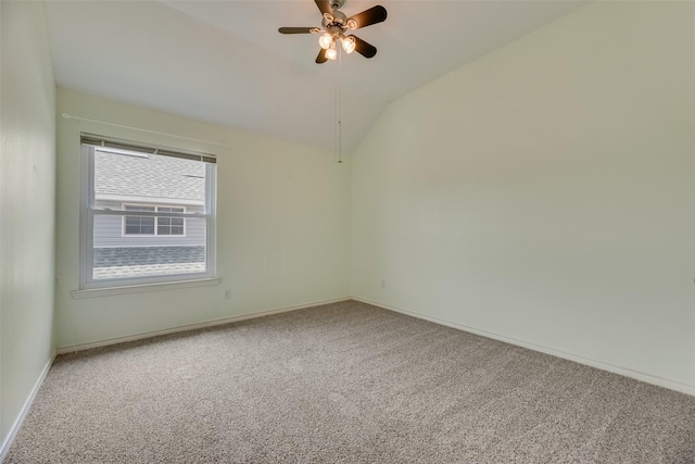 3208 Greenglen Dr, Carrollton, TX 75007 - spare room with carpet flooring, lofted ceiling, baseboards, and ceiling fan