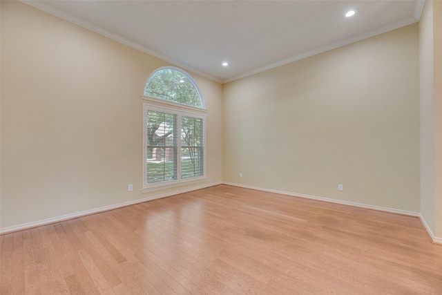3208 Greenglen Dr, Carrollton, TX 75007 - spare room featuring light wood-type flooring, crown molding, baseboards, and recessed lighting