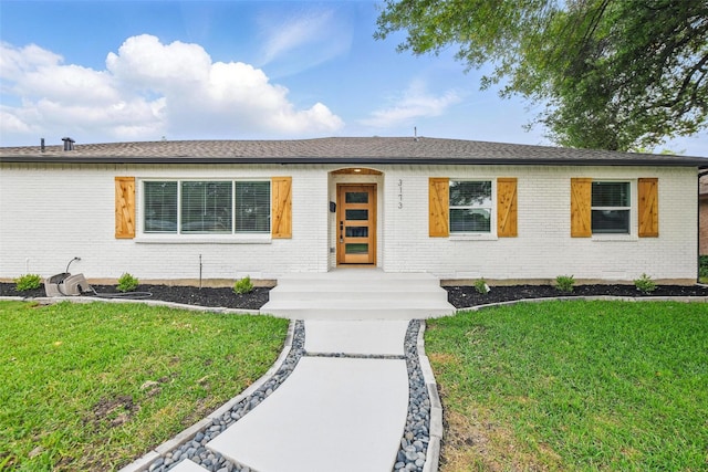 3173 Catamore Ln, Dallas, TX 75229 - view of front of home with brick siding and a front yard