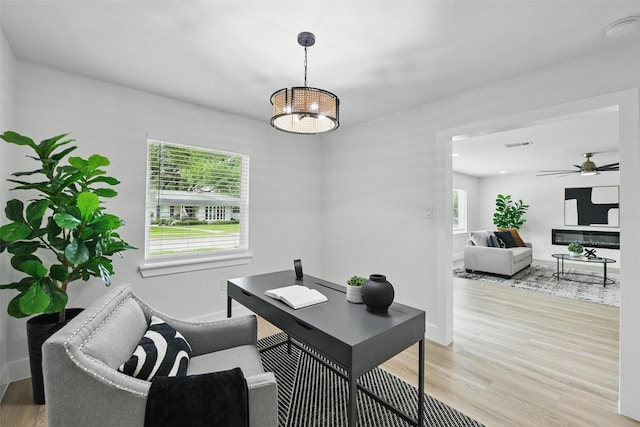 3173 Catamore Ln, Dallas, TX 75229 - office featuring light wood-style flooring, baseboards, and a ceiling fan