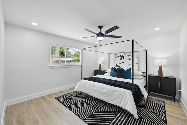 3173 Catamore Ln, Dallas, TX 75229 - bedroom with light wood-style floors, baseboards, recessed lighting, and ceiling fan