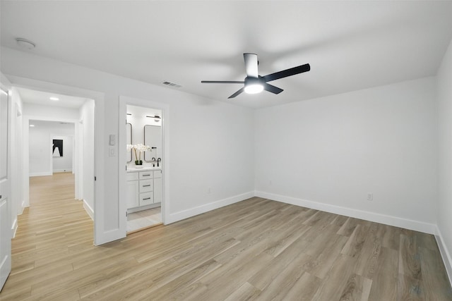 3173 Catamore Ln, Dallas, TX 75229 - unfurnished bedroom with light wood-style flooring, baseboards, and ensuite bathroom
