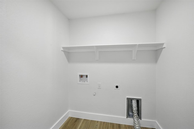 3173 Catamore Ln, Dallas, TX 75229 - washroom with hookup for an electric dryer, dark wood-type flooring, hookup for a gas dryer, hookup for a washing machine, and baseboards