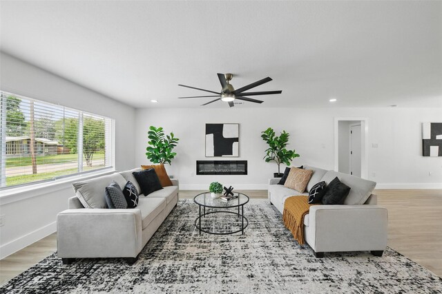 3173 Catamore Ln, Dallas, TX 75229 - living area with ceiling fan, light wood-type flooring, recessed lighting, and baseboards