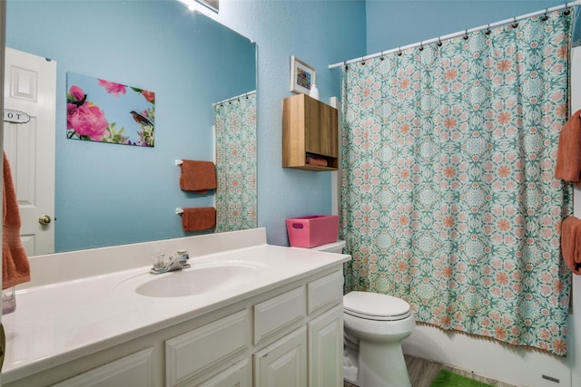 6837 Beverly Glen Dr, Fort Worth, TX 76132 - full bathroom with vanity, toilet, and shower / bath combo with shower curtain