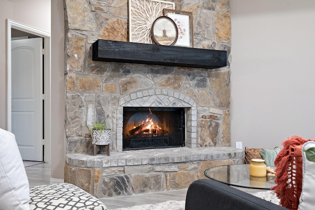 123 Cedar Elm Ln, Nevada, TX 75173 - detailed view of a stone fireplace and wood finished floors