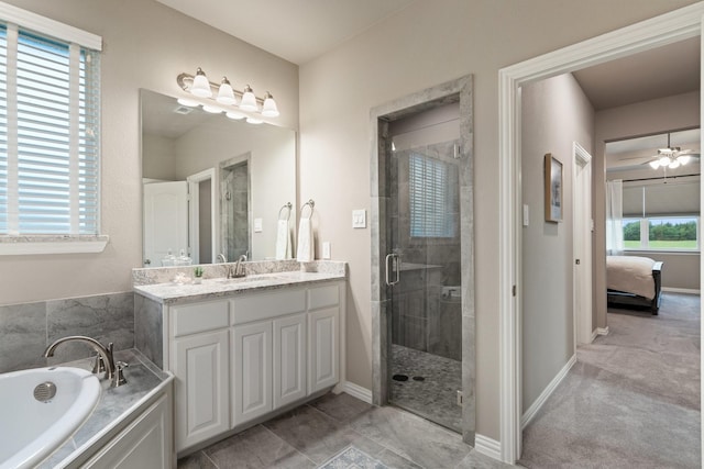 123 Cedar Elm Ln, Nevada, TX 75173 - full bathroom featuring vanity, a garden tub, a stall shower, ensuite bath, and baseboards