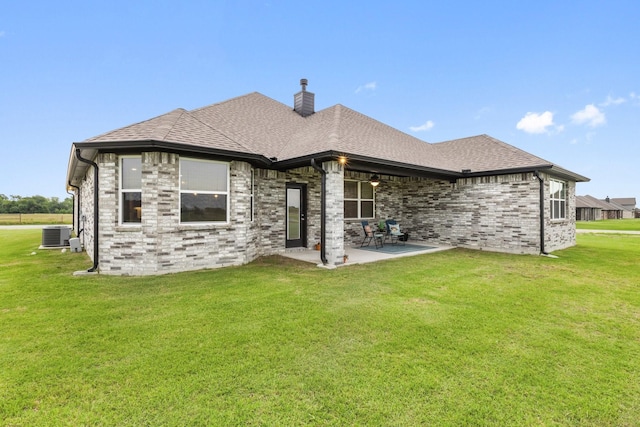 123 Cedar Elm Ln, Nevada, TX 75173 - back of property featuring a patio area, a yard, a chimney, central AC unit, and a shingled roof