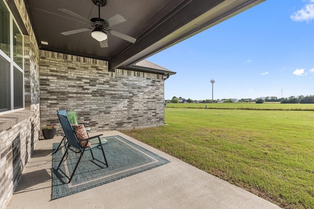 123 Cedar Elm Ln, Nevada, TX 75173 - view of patio / terrace featuring ceiling fan and a rural view