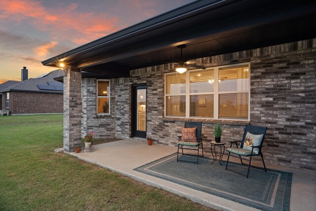 123 Cedar Elm Ln, Nevada, TX 75173 - patio terrace at dusk featuring a yard and a patio area