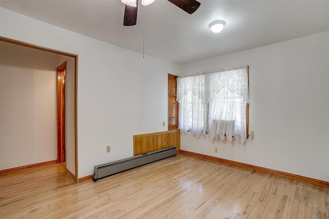 1245 Hodgson St, Fort Worth, TX 76115 - spare room with a baseboard radiator, ceiling fan, light wood finished floors, and baseboards