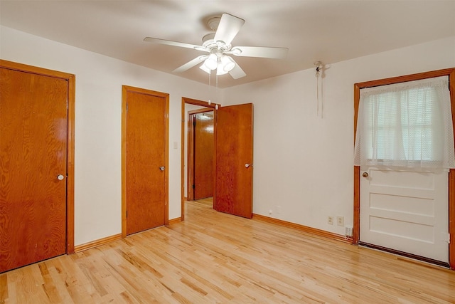 1245 Hodgson St, Fort Worth, TX 76115 - unfurnished room featuring light wood finished floors, ceiling fan, and baseboards