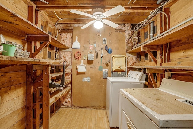 1245 Hodgson St, Fort Worth, TX 76115 - laundry area featuring light wood-type flooring, a ceiling fan, separate washer and dryer, and wooden walls