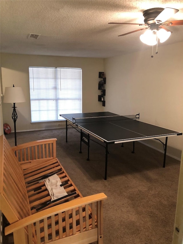 3107 Green Valley Ln, Arlington, TX 76014 - game room featuring carpet flooring, a ceiling fan, and a textured ceiling