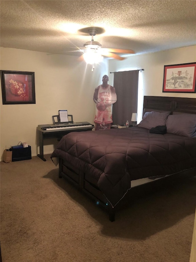 3107 Green Valley Ln, Arlington, TX 76014 - bedroom featuring a textured ceiling, carpet, and ceiling fan