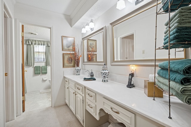 10930 Ridgemeadow Dr, Dallas, TX 75218 - full bath with vanity, ornamental molding, toilet, and a textured ceiling