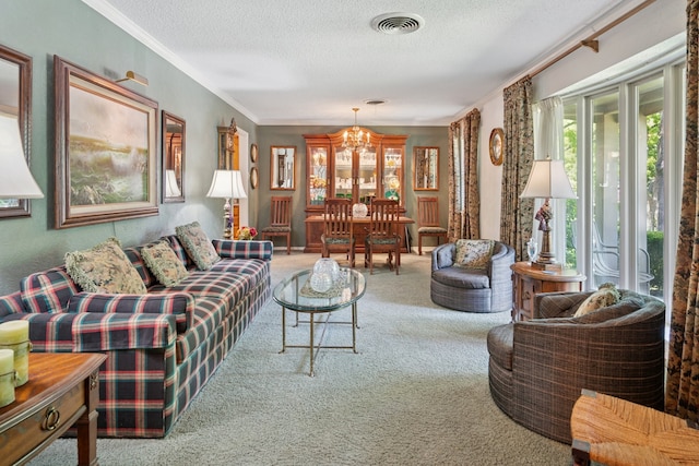 10930 Ridgemeadow Dr, Dallas, TX 75218 - carpeted living area with a textured ceiling, ornamental molding, and a chandelier