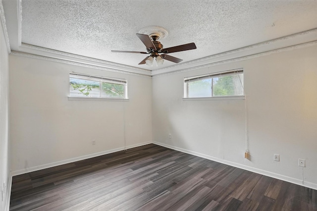 6330 Autumn Woods Trl, Dallas, TX 75232 - empty room with plenty of natural light, a textured ceiling, dark wood-style flooring, a ceiling fan, and baseboards