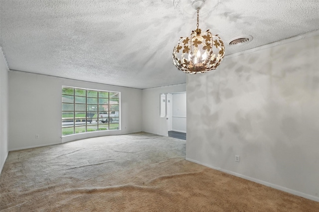 6330 Autumn Woods Trl, Dallas, TX 75232 - empty room with a chandelier, carpet floors, a textured ceiling, and baseboards