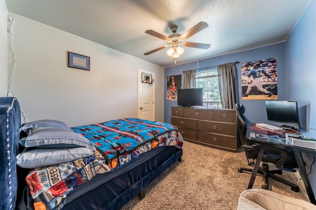 313 Donna Cir, Granbury, TX 76049 - carpeted bedroom featuring a desk, a textured ceiling, ceiling fan, and a textured wall