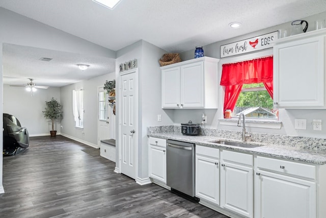 5789 Southfork Dr N, Royse City, TX 75189 - kitchen featuring stainless steel dishwasher, a textured ceiling, white cabinets, dark wood-style flooring, and a ceiling fan