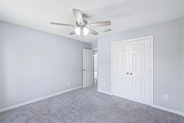 5789 Southfork Dr N, Royse City, TX 75189 - unfurnished bedroom with carpet, a closet, a textured ceiling, and ceiling fan