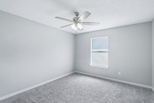 5789 Southfork Dr N, Royse City, TX 75189 - carpeted spare room featuring ceiling fan and a textured ceiling