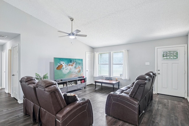 5789 Southfork Dr N, Royse City, TX 75189 - living room featuring a textured ceiling, dark wood-style flooring, vaulted ceiling, and a ceiling fan