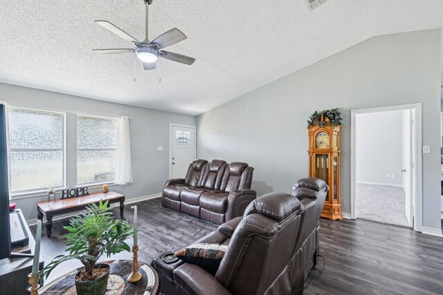 5789 Southfork Dr N, Royse City, TX 75189 - living area featuring vaulted ceiling, dark wood-style flooring, a ceiling fan, and a textured ceiling