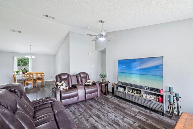 5789 Southfork Dr N, Royse City, TX 75189 - living area with wood finished floors, a chandelier, a ceiling fan, and a textured ceiling