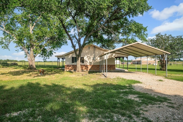 190 Rs County Road 4330, Point, TX 75472 - view of yard featuring a carport and driveway