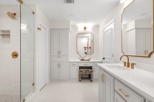 4315 Laren Ln, Dallas, TX 75244 - bathroom with tiled shower and vanity