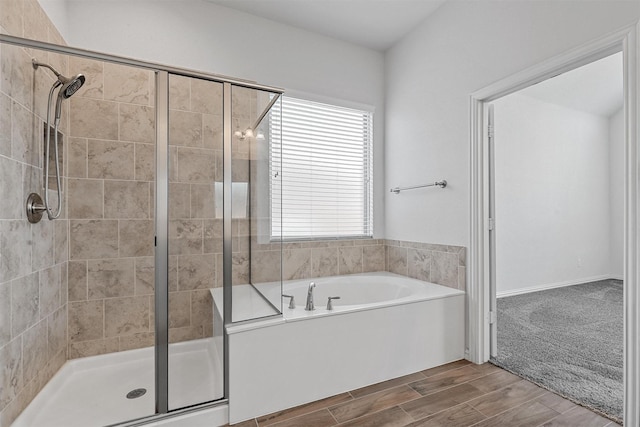 15232 Primrose Garden Ct, Aledo, TX 76008 - bathroom with a stall shower, a bath, and wood finished floors