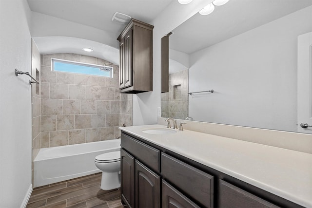 15232 Primrose Garden Ct, Aledo, TX 76008 - bathroom featuring toilet, vanity, wood finished floors,  shower combination, and baseboards