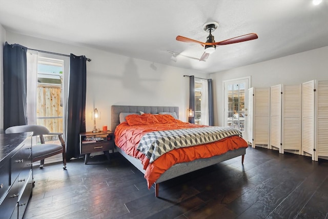 2500 Indian Hills Dr, Plano, TX 75075 - bedroom featuring multiple windows, hardwood / wood-style floors, and ceiling fan