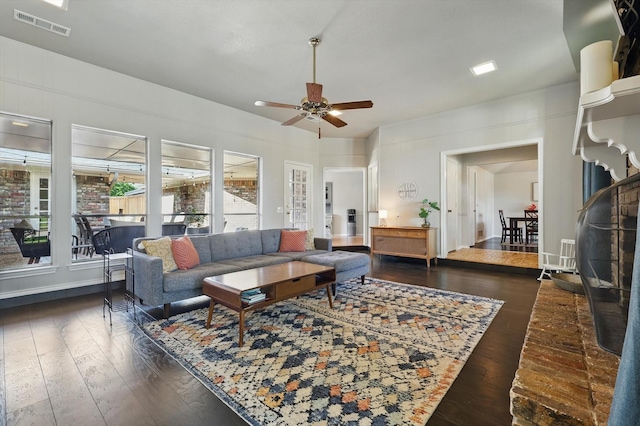 2500 Indian Hills Dr, Plano, TX 75075 - living room with dark wood-style floors and ceiling fan