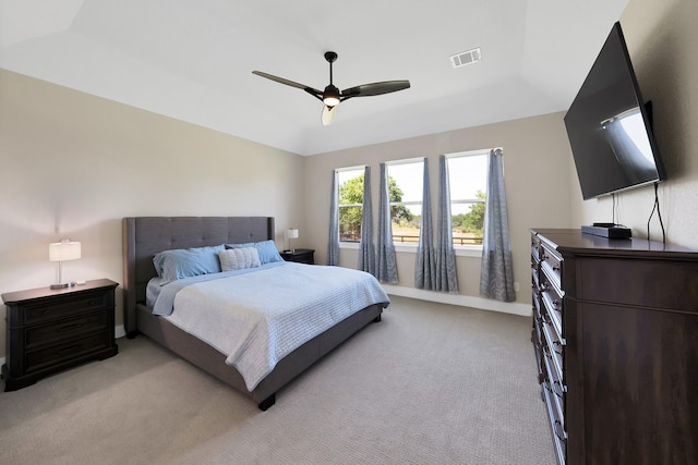 119 Cody Ave, Decatur, TX 76234 - bedroom featuring light colored carpet, ceiling fan, and a raised ceiling