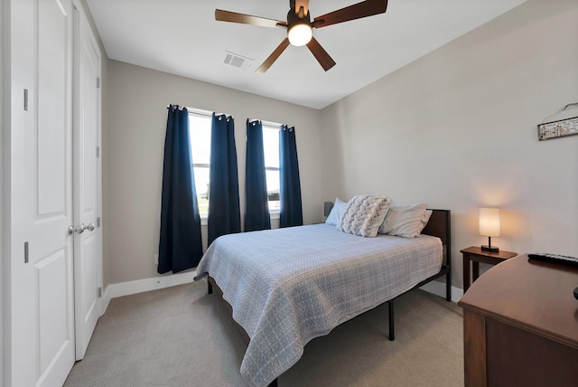119 Cody Ave, Decatur, TX 76234 - bedroom featuring baseboards, light carpet, and a ceiling fan
