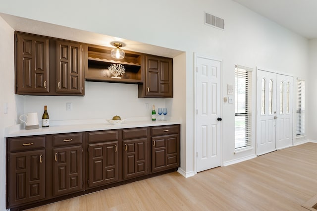 4218 Aralia St, Mesquite, TX 75150 - bar area featuring light wood-style flooring and baseboards