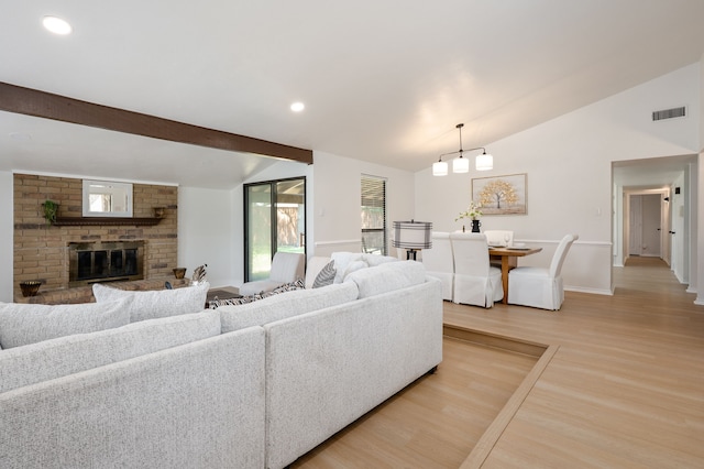 4218 Aralia St, Mesquite, TX 75150 - living area featuring light wood-type flooring, a fireplace, baseboards, and recessed lighting